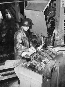 worker uses the Smith Butchering Machine